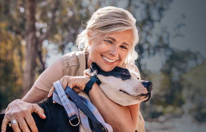 Woman smiling with dog