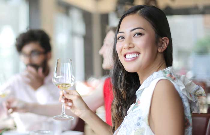 Woman smiling with wine